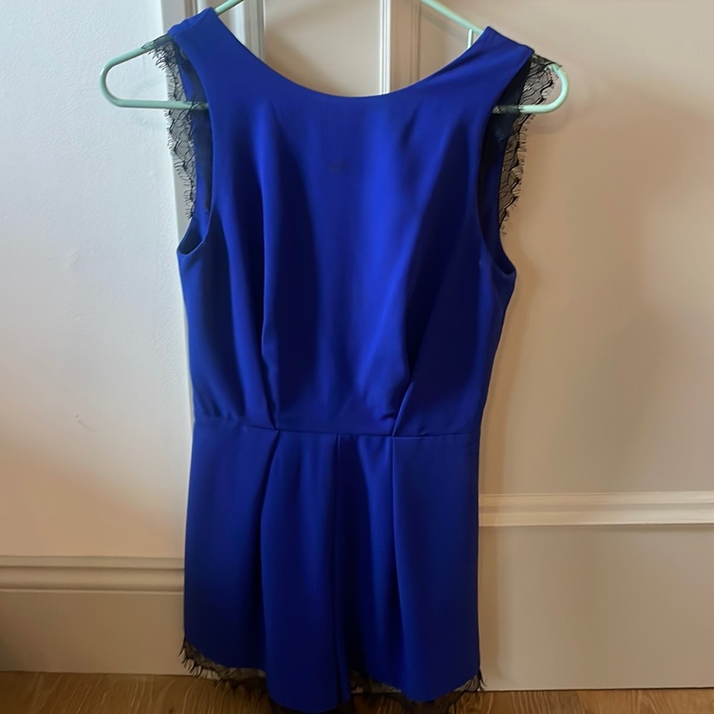 Cute Dark Blue with black Lace detail Romper. Bar III brand